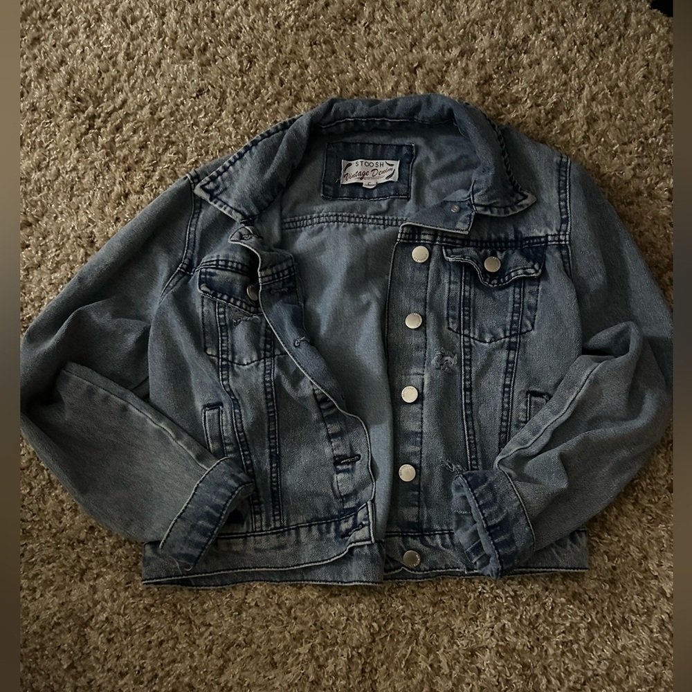 Distressed denim jacket